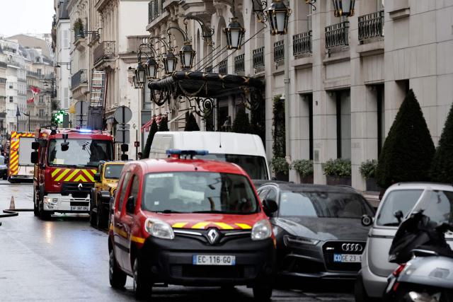 Firefighters work on the site of the Brisol Hotel where a "fairly large" fire broke out in the basement of the Hotel in Paris on March 25, 2026. Around 100 firefighters are on site to tackle this ‘fairly large ongoing fire’, the Paris Fire Brigade said, confirming a report by Europe 1. Three people have suffered minor injuries, it added. Located on Rue du Faubourg Saint-Honore, not far from the Elysee Palace, the Bristol is a luxury hotel owned by the German multinational Oetker. (Photo by STEPHANE DE SAKUTIN / AFP)