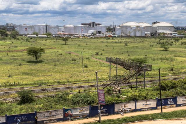 A general view of the Kenya Pipeline Company (KPC) Oil depot, at the state corporation's headquarters, responsible for transporting, storing and delivering petroleum products to Kenya's consumers in Nairobi on March 25, 2026. The war between the United States and Iran, now in its fourth week, has sent shockwaves through global markets, with fuel prices soaring amid fast depleting stocks across Kenya with government accusing marketers of 'fuel hoarding' to stoke surging demand-driven price hikes. Kenya currently sources all its fuel from the Middle East through government-to-government deals with Gulf crude producers and refiners. (Photo by Tony KARUMBA / AFP)