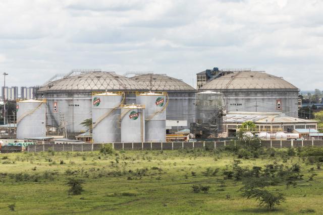 A general view of the Kenya Pipeline Company (KPC) Oil depot, at the state corporation's headquarters, responsible for transporting, storing and delivering petroleum products to Kenya's consumers in Nairobi on March 25, 2026. The war between the United States and Iran, now in its fourth week, has sent shockwaves through global markets, with fuel prices soaring amid fast depleting stocks across Kenya with government accusing marketers of 'fuel hoarding' to stoke surging demand-driven price hikes. Kenya currently sources all its fuel from the Middle East through government-to-government deals with Gulf crude producers and refiners. (Photo by Tony KARUMBA / AFP)