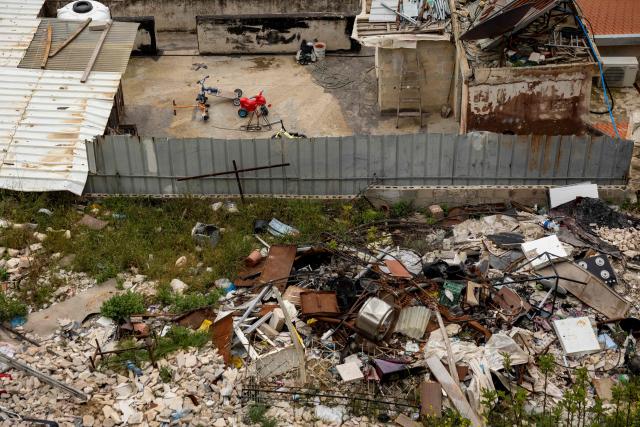 Childrens toys are seen on a rooftop play area as 11 Palestinian families in the Batan al-Hawa area of Silwan are evicted to make room for Israeli settlers, in the predominantly Arab neighbourhood of Silwan in East Jerusalem, on March 25, 2026. The eviction comes amid a decades-long legal battle between hundreds of Palestinian residents and an Israeli nonprofit, which claims the land under a 1970 law allowing Jews to reclaim property in East Jerusalem - rights not extended to Palestinians who were forced to abandon property in the cities. (Photo by Odd ANDERSEN / AFP)
