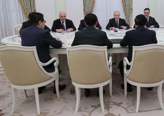 Russian President Vladimir Putin meets with Vietnamese Prime Minister at the Kremlin in Moscow on March 25, 2026. (Photo by MAXIM SHIPENKOV / POOL / AFP)