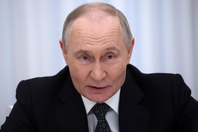 Russian President Vladimir Putin meets with Vietnamese Prime Minister at the Kremlin in Moscow on March 25, 2026. (Photo by MAXIM SHIPENKOV / POOL / AFP)