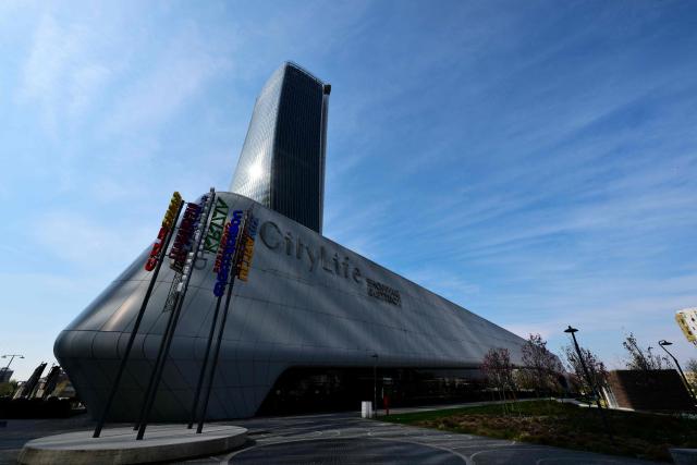 This picture shows Generali Tower or Hadid Tower designed by the Anglo-Iraqi architect Zaha Hadid, hosting officies and a shopping mall in the CityLife district of Milan, on March 25, 2026. (Photo by Stefano RELLANDINI / AFP)