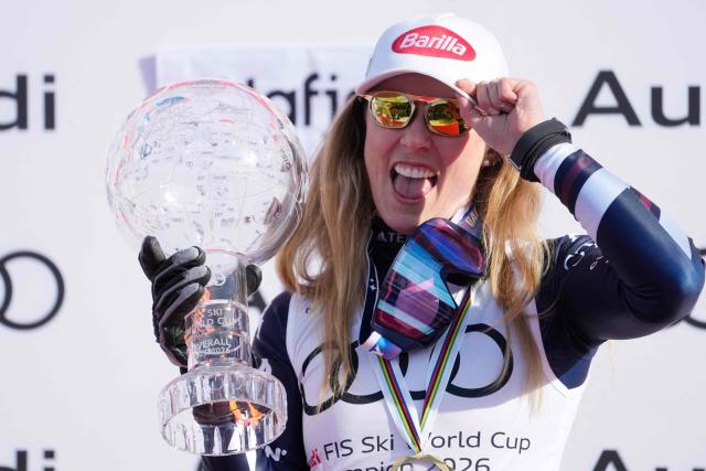 TOPSHOT - US' Mikaela Shiffrin celebrates on the podium for the 2025/2026 Women's Giant Slalom Cup in Hafjell on March 25, 2026. Mikaela Shiffrin won the overall World Cup title for the sixth time in her career, equaling the women’s record set by Annemarie Moser-Prцll in the 1970s. (Photo by Cornelius Poppe / NTB / AFP) / Norway OUT