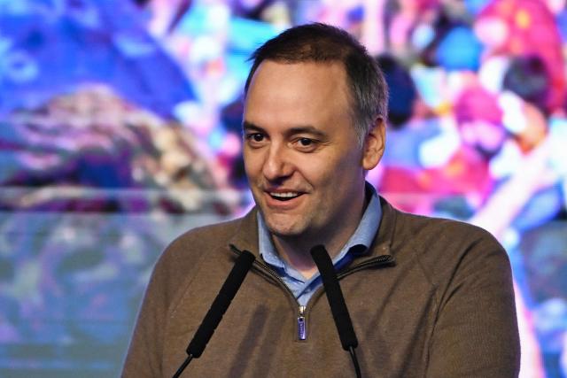 (FILES) Spokesperson for the Presidency Manuel Adorni speaks at the ruling party's La Libertad Avanza headquarters following the results of the national midterm legislative election in Buenos Aires on October 26, 2025. The Argentine Chief of the Cabinet of Ministers, Manuel Adorni, dismissed on March 25, 2026, questions about his assets following the publication of images of a family trip on a private jet and reports of alleged undeclared assets. (Photo by Luis ROBAYO / AFP)
