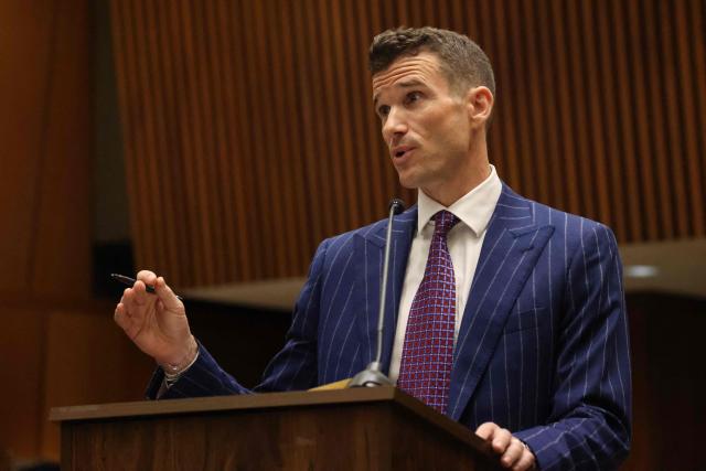 Los Angeles Deputy District Attorney Alexander Bott speaks during the arraignment for Ivanna Lisette Ortiz, accused of firing shots at the home of Barbadian singer Rihanna, at Clara Shortridge Foltz Criminal Justice Center in Los Angeles, on March 25, 2026. Ortiz, alleged to have shot up the luxury Los Angeles home of global megastar Rihanna was charged on March 10 with attempted murder. Prosecutors in the city said Ivanna Lisette Ortiz, 35, had opened fire at the sprawling estate on March 8. (Photo by Genaro Molina / POOL / AFP)