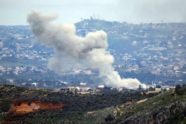 Smoke rises from the site of an Israeli air strike that targeted the southern Lebanese village of Dayr Seryan on March 25, 2026. Lebanon was pulled into the Middle East war when Tehran-backed militant group Hezbollah began firing rockets into Israel on March 2 to avenge the killing of Iran's supreme leader Ayatollah Ali Khamenei. (Photo by AFP)