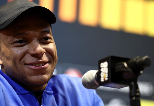 France's striker and captain Kylian Mbappe speaks during a press conference at Gillette Stadium in Foxborough, Massachusetts, on March 25, 2026, on the eve of a friendly match against Brazil. (Photo by Franck FIFE / AFP)