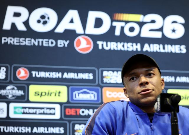 France's striker and captain Kylian Mbappe speaks during a press conference at Gillette Stadium in Foxborough, Massachusetts, on March 25, 2026, on the eve of a friendly match against Brazil. (Photo by Franck FIFE / AFP)