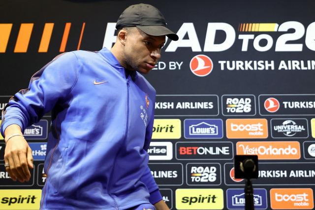 France's striker and captain Kylian Mbappe speaks during a press conference at Gillette Stadium in Foxborough, Massachusetts, on March 25, 2026, on the eve of a friendly match against Brazil. (Photo by Franck FIFE / AFP)