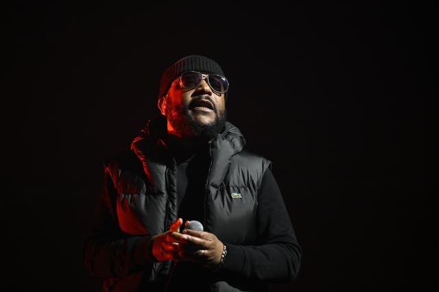 French rapper Lino performs on stage during a concert in tribute to French late rapper Werenoi at the Accor Arena in Paris on March 25, 2026. (Photo by JULIEN DE ROSA / AFP)