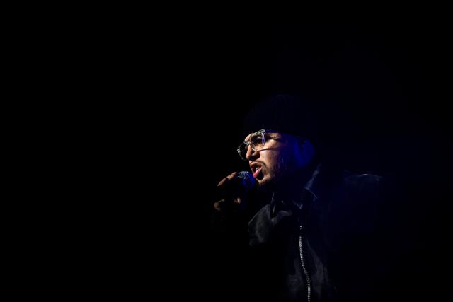 Belgian rapper Hamza performs on stage during a concert in tribute to French late rapper Werenoi at the Accor Arena in Paris on March 25, 2026. (Photo by JULIEN DE ROSA / AFP)