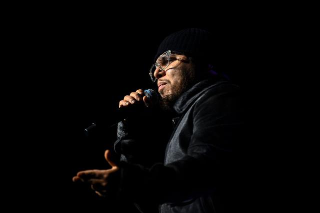 Belgian rapper Hamza performs on stage during a concert in tribute to French late rapper Werenoi at the Accor Arena in Paris on March 25, 2026. (Photo by JULIEN DE ROSA / AFP)