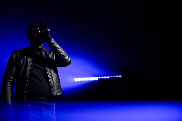 French-Moroccan rapper Niro performs on stage during a concert in tribute to French late rapper Werenoi at the Accor Arena in Paris on March 25, 2026. (Photo by JULIEN DE ROSA / AFP)