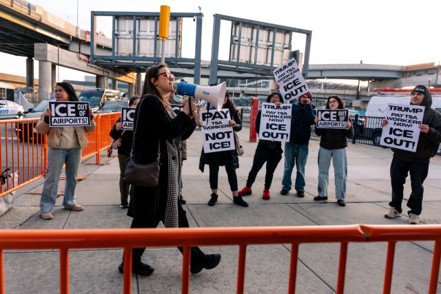 People protest ICE presence outside Terminal 4 at John F. Kennedy International Airport in New York, on March 25, 2026. US Immigration and Customs Enforcement (ICE) at the center of a firestorm over heavy-handed enforcement tactics began deploying Monday to major airports, as officials scrambled to ease mounting travel disruption during a prolonged, partial government shutdown. (Photo by Angelina Katsanis / AFP)