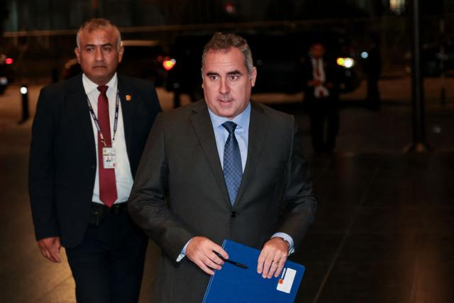 Peru's presidential candidate Rafael Belaunde, for the Popular Liberty party, arrives at the third round of debates on tackling crime and corruption at the Lima Convention Center in Lima on March 25, 2026. Peru will hold presidential elections on April 12. (Photo by Connie FRANCE / AFP)