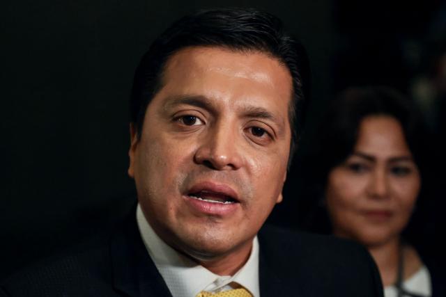Peru's presidential candidate Paul Jaimes, for the Progresemos party, speaks to the media as he arrives at the third round of debates on tackling crime and corruption at the Lima Convention Center in Lima on March 25, 2026. Peru will hold presidential elections on April 12. (Photo by Connie FRANCE / AFP)