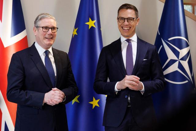 President of the Republic of Finland Alexander Stubb (R) greets Britain's Prime Minister Keir Starmer prior the Joint Expeditionary Force JEF Leaders’ Summit in Helsinki on March 26, 2026. (Photo by Seppo Samuli / Lehtikuva / AFP) / Finland OUT
