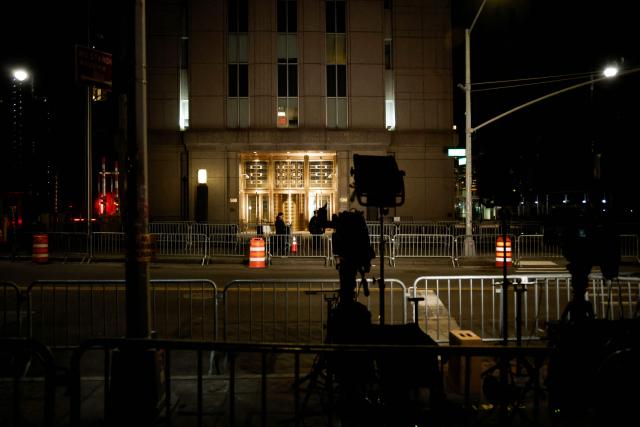 This photograph shows the Daniel Patrick Moynihan United States Courthouse as a convoy believed to be carrying ousted Venezuelan president Nicolas Maduro has arrived for his federal court appearance in Manhattan on March 26, 2026. Lawyers for the ousted Venezuelan president Nicolas Maduro are expected to push for the dismissal of his drug trafficking charges when he appears in a New York court March 26. The Manhattan hearing comes as Washington cautiously warms ties with Caracas, with the question of who will pay the legal fees of the former autocrat and his wife expected to take center stage. (Photo by John Lamparski / AFP)