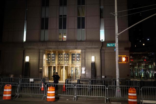 This photograph shows the Daniel Patrick Moynihan United States Courthouse as a convoy believed to be carrying ousted Venezuelan president Nicolas Maduro has arrived for his federal court appearance in Manhattan on March 26, 2026. Lawyers for the ousted Venezuelan president Nicolas Maduro are expected to push for the dismissal of his drug trafficking charges when he appears in a New York court March 26. The Manhattan hearing comes as Washington cautiously warms ties with Caracas, with the question of who will pay the legal fees of the former autocrat and his wife expected to take center stage. (Photo by CHARLY TRIBALLEAU / AFP)