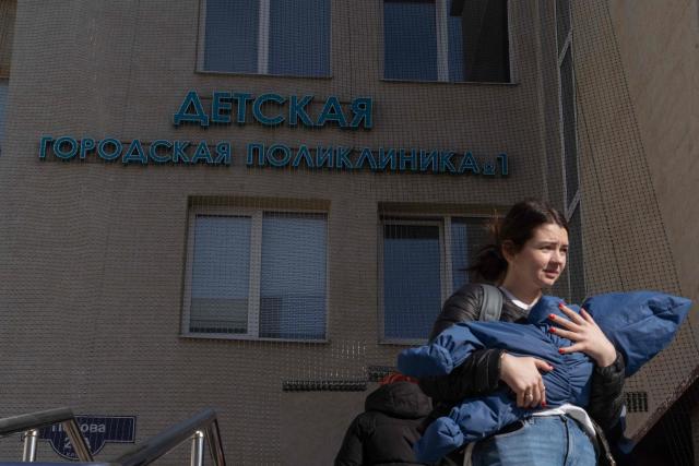 Anti-drone netting covers a children's clinic in Belgorod, the main city of Russia's western Belgorod region bordering Ukraine, on March 12, 2026, amid the ongoing Russian-Ukrainian conflict. (Photo by Andrey BORODULIN / AFP)