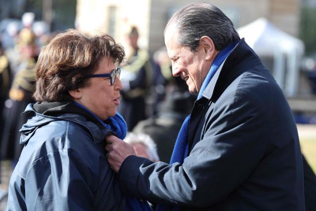 Former Minister and former First Secretary of the Socialist Party Martine Aubry (L) and Former First Secretary of the Socialist Party Jean-Christophe Cambadélis arrive at a national tribute to former French Prime Minister Lionel Jospin at the Hotel des Invalides in Paris on March 26, 2026. Born on July 12, 1937, former French prime minister Lionel Jospin, a Socialist who introduced the 35-hour work week and civil partnerships for gay couples, has died aged 88, his family said on March 23, 2026. (Photo by Ludovic MARIN / AFP)