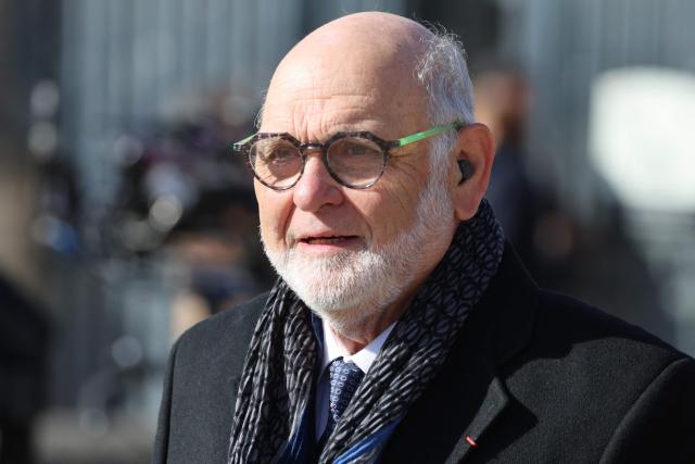 Former National Secreatry of the French Communist Party Robert Hue arrives at a national tribute to former French Prime Minister Lionel Jospin at the Hotel des Invalides in Paris on March 26, 2026. Born on July 12, 1937, former French prime minister Lionel Jospin, a Socialist who introduced the 35-hour work week and civil partnerships for gay couples, has died aged 88, his family said on March 23, 2026. (Photo by Ludovic MARIN / AFP)