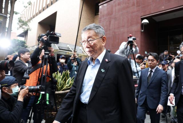 Former Taipei mayor and 2024 presidential candidate Ko Wen-je leaves the Taipei District Court in Taipei on March 26, 2026. Ko, who once ran for the presidency, was sentenced on March 26, to 17 years in prison for taking bribes and misusing political donations. (Photo by I-HWA CHENG / AFP)
