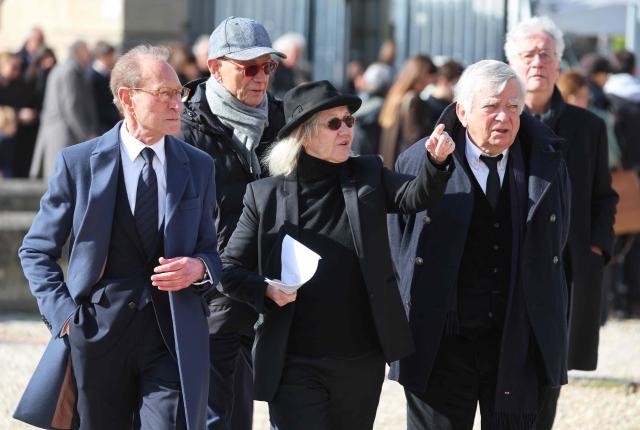 (From L) Former mayor of Paris Bertrand Delanoë, Former Lionel Jospin's advisor Marie-France Lavarini and Former Minister Jean Glavany arrive at a national tribute to former French Prime Minister Lionel Jospin at the Hotel des Invalides in Paris on March 26, 2026. Born on July 12, 1937, former French prime minister Lionel Jospin, a Socialist who introduced the 35-hour work week and civil partnerships for gay couples, has died aged 88, his family said on March 23, 2026. (Photo by Ludovic MARIN / AFP)