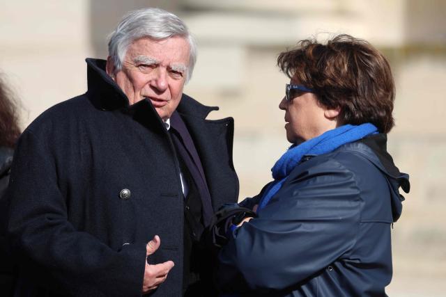Former Minister Jean Glavany (L) and Former Minister and former First Secretary of the Socialist Party Martine Aubry arrives at a national tribute to former French Prime Minister Lionel Jospin at the Hotel des Invalides in Paris on March 26, 2026. Born on July 12, 1937, former French prime minister Lionel Jospin, a Socialist who introduced the 35-hour work week and civil partnerships for gay couples, has died aged 88, his family said on March 23, 2026. (Photo by Ludovic MARIN / AFP)