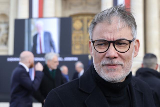 First Secretary of the French Socialist party (PS) and Socialistes et Apparentes' MP Olivier Faure arrives at a national tribute to former French Prime Minister Lionel Jospin at the Hotel des Invalides in Paris on March 26, 2026. Born on July 12, 1937, former French prime minister Lionel Jospin, a Socialist who introduced the 35-hour work week and civil partnerships for gay couples, has died aged 88, his family said on March 23, 2026. (Photo by Ludovic MARIN / AFP)