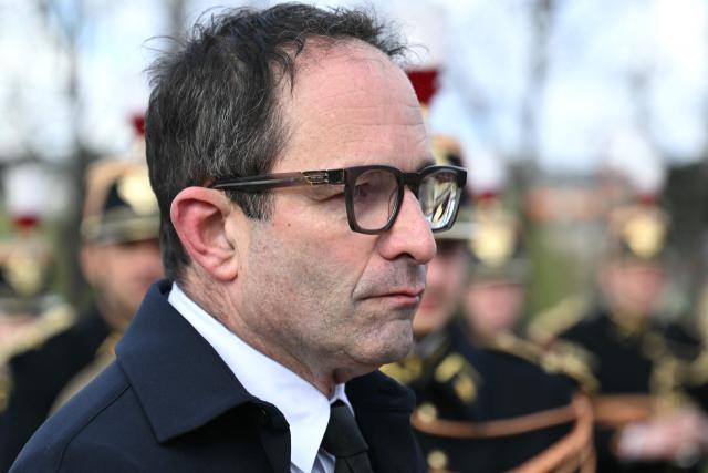 Former minister Benoît Hamon arrives at a national tribute to former French Prime Minister Lionel Jospin at the Hotel des Invalides in Paris on March 26, 2026. Born on July 12, 1937, former French prime minister Lionel Jospin, a Socialist who introduced the 35-hour work week and civil partnerships for gay couples, has died aged 88, his family said on March 23, 2026. (Photo by Bertrand GUAY / AFP)