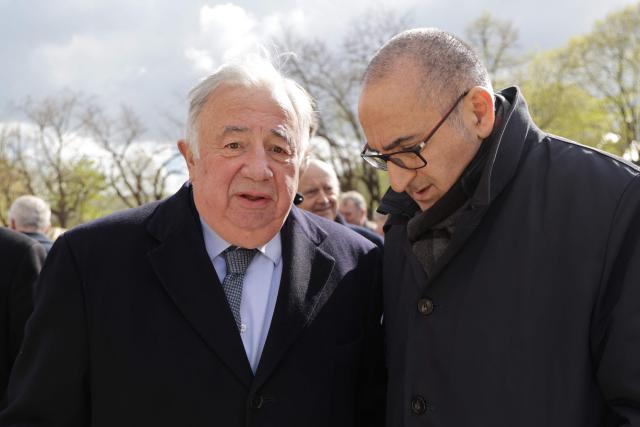 French lawmaker and Senate's President Gerard Larcher (L) and France's Interior Minister Laurent Nunez arrive at a national tribute to former French Prime Minister Lionel Jospin at the Hotel des Invalides in Paris on March 26, 2026. Born on July 12, 1937, former French prime minister Lionel Jospin, a Socialist who introduced the 35-hour work week and civil partnerships for gay couples, has died aged 88, his family said on March 23, 2026. (Photo by Ludovic MARIN / AFP)