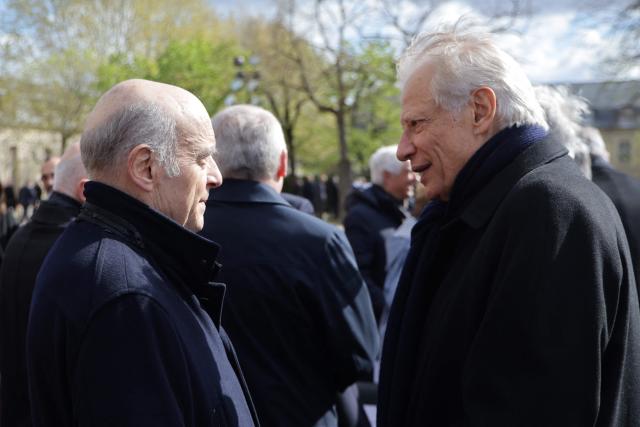 Formers French Prime Ministers Dominique de Villepin (R) and Alain Juppe arrive at a national tribute to former French Prime Minister Lionel Jospin at the Hotel des Invalides in Paris on March 26, 2026. Born on July 12, 1937, former French prime minister Lionel Jospin, a Socialist who introduced the 35-hour work week and civil partnerships for gay couples, has died aged 88, his family said on March 23, 2026. (Photo by Ludovic MARIN / AFP)