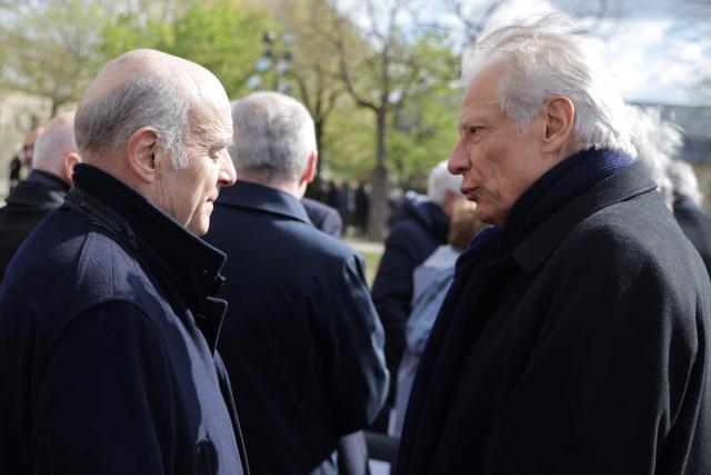 Formers French Prime Ministers Dominique de Villepin (R) and Alain Juppe arrive at a national tribute to former French Prime Minister Lionel Jospin at the Hotel des Invalides in Paris on March 26, 2026. Born on July 12, 1937, former French prime minister Lionel Jospin, a Socialist who introduced the 35-hour work week and civil partnerships for gay couples, has died aged 88, his family said on March 23, 2026. (Photo by Ludovic MARIN / AFP)