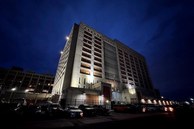 An exterior view of the Metropolitan Detention Center is seen in the Brooklyn borough of New York City, where ousted Venezuelan president Nicolas Maduro is detained, ahead of his court appearance later in the day, on March 26, 2026. Lawyers for the ousted Venezuelan president Nicolas Maduro are expected to push for the dismissal of his drug trafficking charges when he appears in a New York court March 26. The Manhattan hearing comes as Washington cautiously warms ties with Caracas, with the question of who will pay the legal fees of the former autocrat and his wife expected to take center stage. (Photo by Leonardo MUNOZ / AFP)
