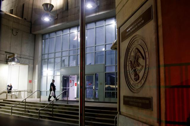 An exterior view of the Metropolitan Detention Center is seen in the Brooklyn borough of New York City, where ousted Venezuelan president Nicolas Maduro is detained, ahead of his court appearance later in the day, on March 26, 2026. Lawyers for the ousted Venezuelan president Nicolas Maduro are expected to push for the dismissal of his drug trafficking charges when he appears in a New York court March 26. The Manhattan hearing comes as Washington cautiously warms ties with Caracas, with the question of who will pay the legal fees of the former autocrat and his wife expected to take center stage. (Photo by Leonardo MUNOZ / AFP)
