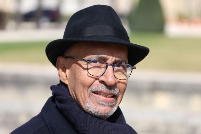 Former head of SOS Racisme NGO, Harlem Desir leaves after a national tribute to former French Prime Minister Lionel Jospin at the Hotel des Invalides in Paris on March 26, 2026. Born on July 12, 1937, former French prime minister Lionel Jospin, a Socialist who introduced the 35-hour work week and civil partnerships for gay couples, has died aged 88, his family said on March 23, 2026. (Photo by Ludovic MARIN / AFP)