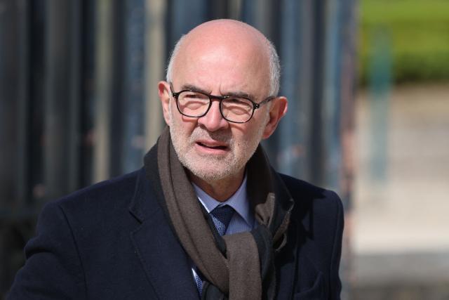 Former Minister and member of the European Court of Auditors Pierre Moscovici leaves after during a national tribute to former French Prime Minister Lionel Jospin at the Hotel des Invalides in Paris on March 26, 2026. Born on July 12, 1937, former French prime minister Lionel Jospin, a Socialist who introduced the 35-hour work week and civil partnerships for gay couples, has died aged 88, his family said on March 23, 2026. (Photo by Ludovic MARIN / AFP)