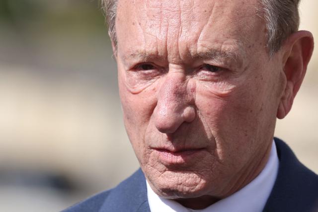 Former mayor of Paris Bertrand Delanoë leaves after a national tribute to former French Prime Minister Lionel Jospin at the Hotel des Invalides in Paris on March 26, 2026. Born on July 12, 1937, former French prime minister Lionel Jospin, a Socialist who introduced the 35-hour work week and civil partnerships for gay couples, has died aged 88, his family said on March 23, 2026. (Photo by Ludovic MARIN / AFP)