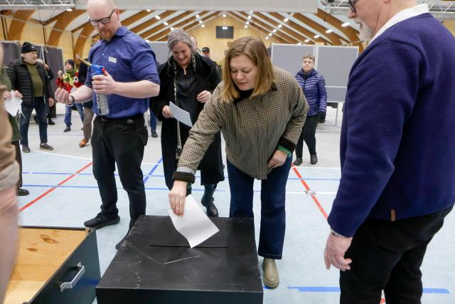 People vote in the election to the Logting, the Parliament of the Faroe Islands, in Torshavn, on March 26, 2026. The Landsstyri, the self-governing government of the Faroe Islands led by the Logmadur, is elected every four years by the Logting. (Photo by Álvur Haraldsen / Ritzau Scanpix / AFP) / Denmark OUT