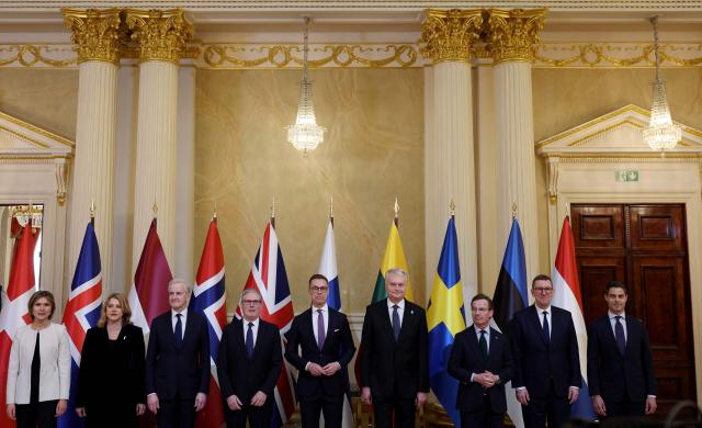 (L-R) Icelandic Prime Minister Kristrun Frostadottir, Latvian Prime Minister Evika Silina, Norwegian Prime Minister Jonas Gahr Store, British Prime Minister Keir Starmer, Finnish President Alexander Stubb, Lithuanian President Gitanas Nauseda, Swedish Prime Minister Ulf Kristersson, Estonian Prime Minister Kristen Michal and Dutch Prime Minister Rob Jetten pose for a family photo at the Joint Expeditionary Force JEF Leaders’ Summit in Helsinki, Finland on March 26, 2026. (Photo by Adrian Dennis / POOL / AFP)