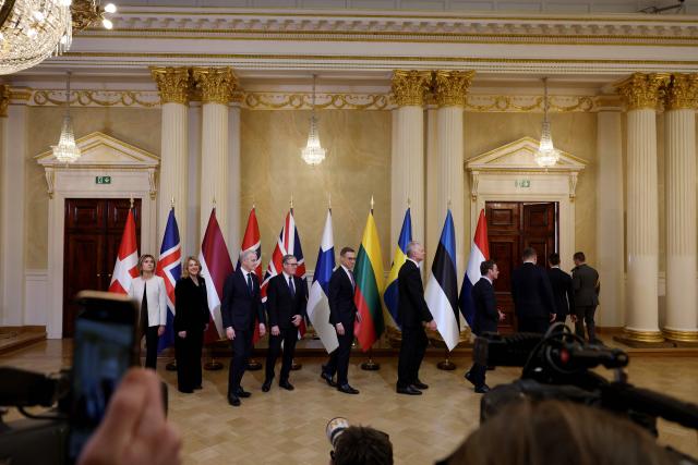 (L-R) Icelandic Prime Minister Kristrun Frostadottir, Latvian Prime Minister Evika Silina, Norwegian Prime Minister Jonas Gahr Store, British Prime Minister Keir Starmer, Finnish President Alexander Stubb, Lithuanian President Gitanas Nauseda, Swedish Prime Minister Ulf Kristersson, Estonian Prime Minister Kristen Michal and Dutch Prime Minister Rob Jetten leave after posing for a family photo at the Joint Expeditionary Force JEF Leaders’ Summit in Helsinki, Finland on March 26, 2026. (Photo by Adrian Dennis / POOL / AFP)