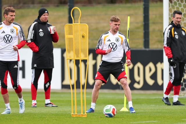 Germany's midfielder #08 Leon Goretzka, Germany's headcoach Julian Nagelsmann and Germany's midfielder #06 Joshua Kimmich Soccer attend a training session before the international friendly footbal match against Switzerland in Herzogenaurach, southern Germany on March 26, 2026. (Photo by Daniel Karmann / AFP)