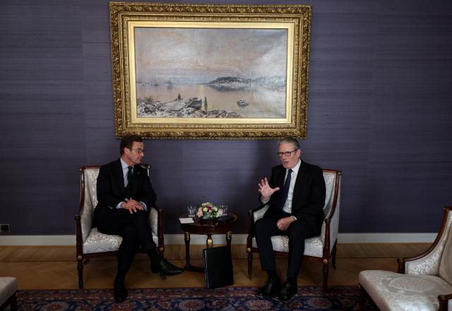 British Prime Minister Keir Starmer (R) and Swedish Prime Minister Ulf Kristersson have taken seat for a bilateral meeting at the Joint Expeditionary Force JEF Leaders’ Summit in Helsinki, Finland on March 26, 2026. (Photo by Adrian Dennis / POOL / AFP)