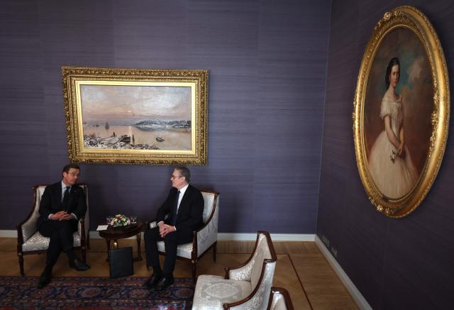 British Prime Minister Keir Starmer (R) and Swedish Prime Minister Ulf Kristersson have taken seat for a bilateral meeting at the Joint Expeditionary Force JEF Leaders’ Summit in Helsinki, Finland on March 26, 2026. (Photo by Adrian Dennis / POOL / AFP)