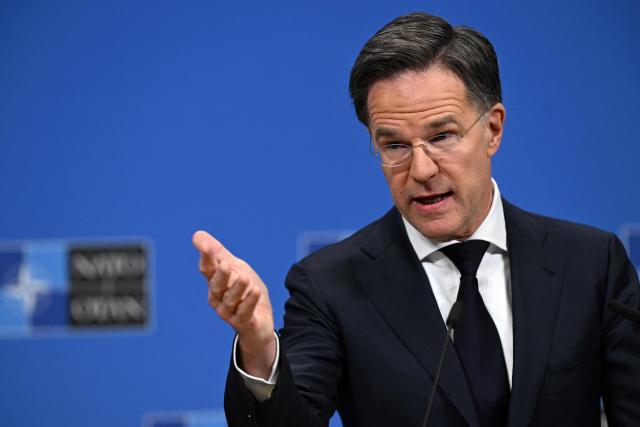 NATO Secretary General Mark Rutte gives a press conference about NATO's general annual report in Brussels on March 26, 2026. A NATO report on March 26 said military spending by member states rose by a fifth year-on-year in 2025 to 574 billion USD. (Photo by Nicolas TUCAT / AFP)