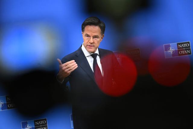 NATO Secretary General Mark Rutte gives a press conference about NATO's general annual report in Brussels on March 26, 2026. A NATO report on March 26 said military spending by member states rose by a fifth year-on-year in 2025 to 574 billion USD. (Photo by Nicolas TUCAT / AFP)