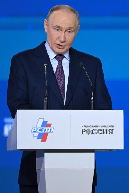 Russian President Vladimir Putin attends the Congress of the Russian Union of Industrialists and Entrepreneurs in Moscow on March 26, 2026. (Photo by Igor IVANKO / AFP)