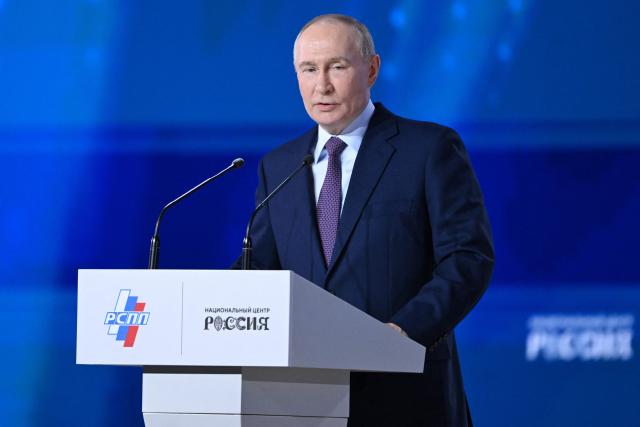 Russian President Vladimir Putin attends the Congress of the Russian Union of Industrialists and Entrepreneurs in Moscow on March 26, 2026. (Photo by Igor IVANKO / AFP)